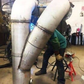 Professional welder completing a practical recruitment test